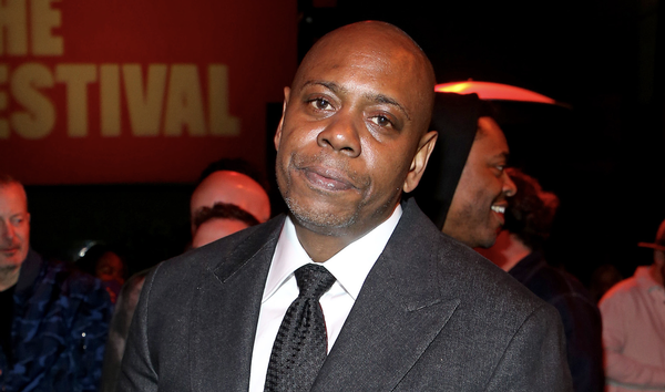 Dave Chappelle tackled to the ground on stage during performance for Netflix is a Joke festival