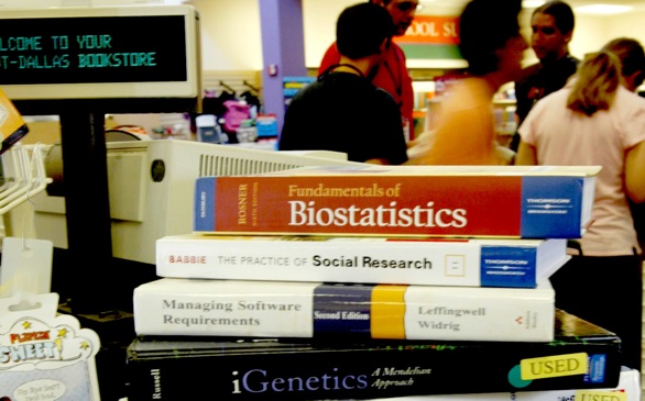 College Students Skip Buying Textbooks, Risk Grades Falling