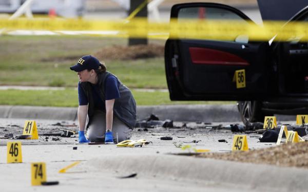 Outside Muhammad cartoon contest in Texas, 2 gunmen are killed and guard is shot